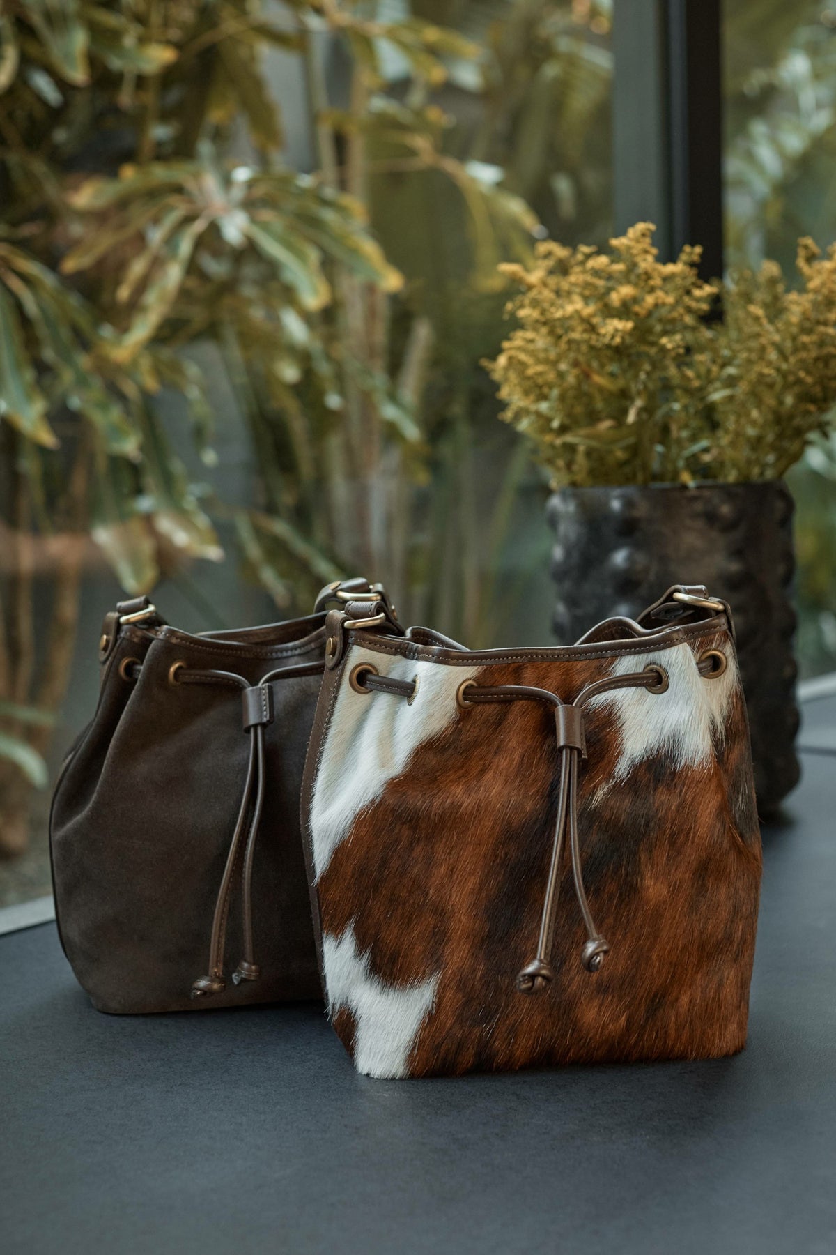ITALIAN CALF HAIR CINCH CROSSBODY BUCKET
