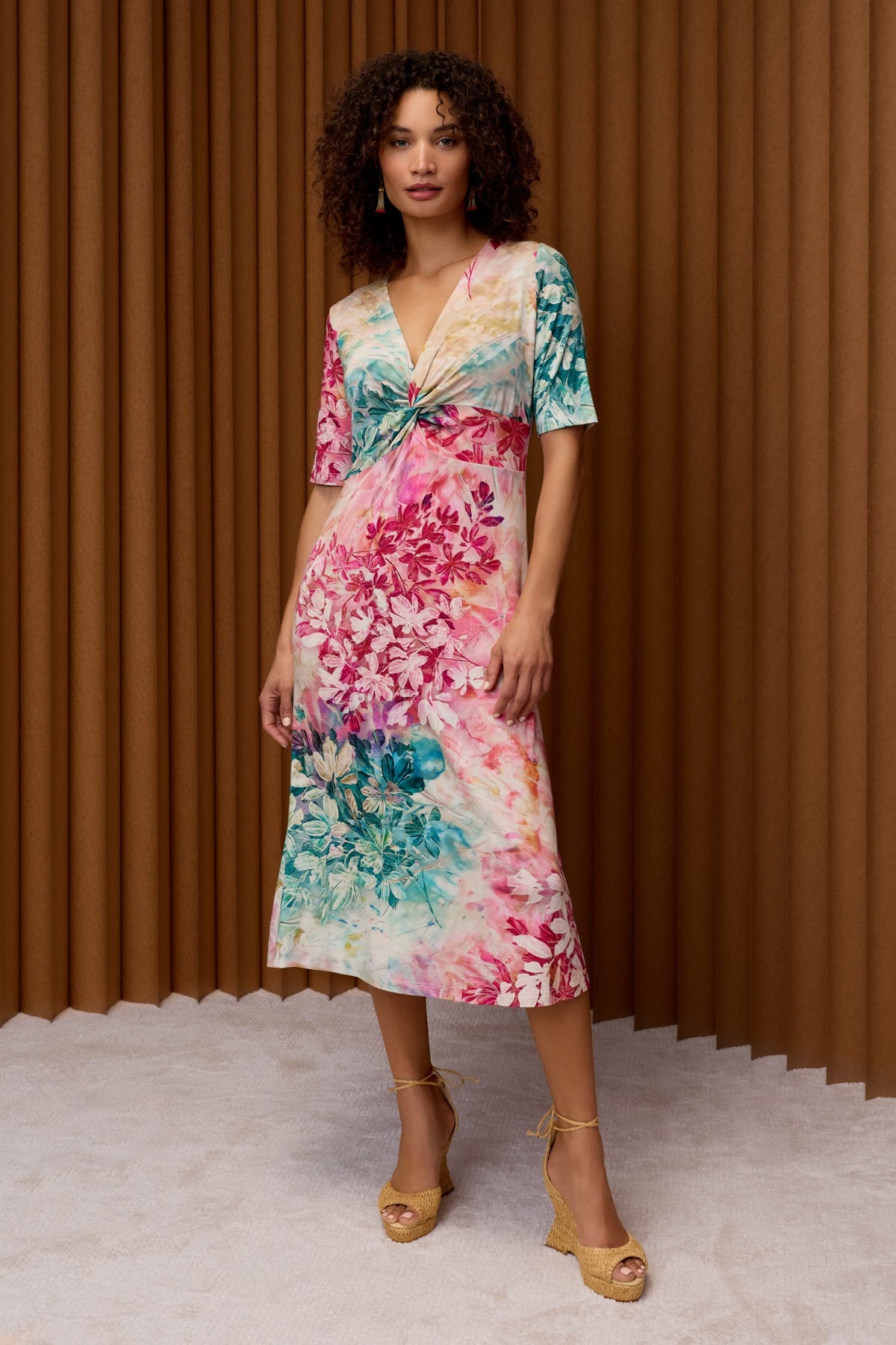 THE JANIE FAVORITE TWIST FRONT MIDI SWING DRESS