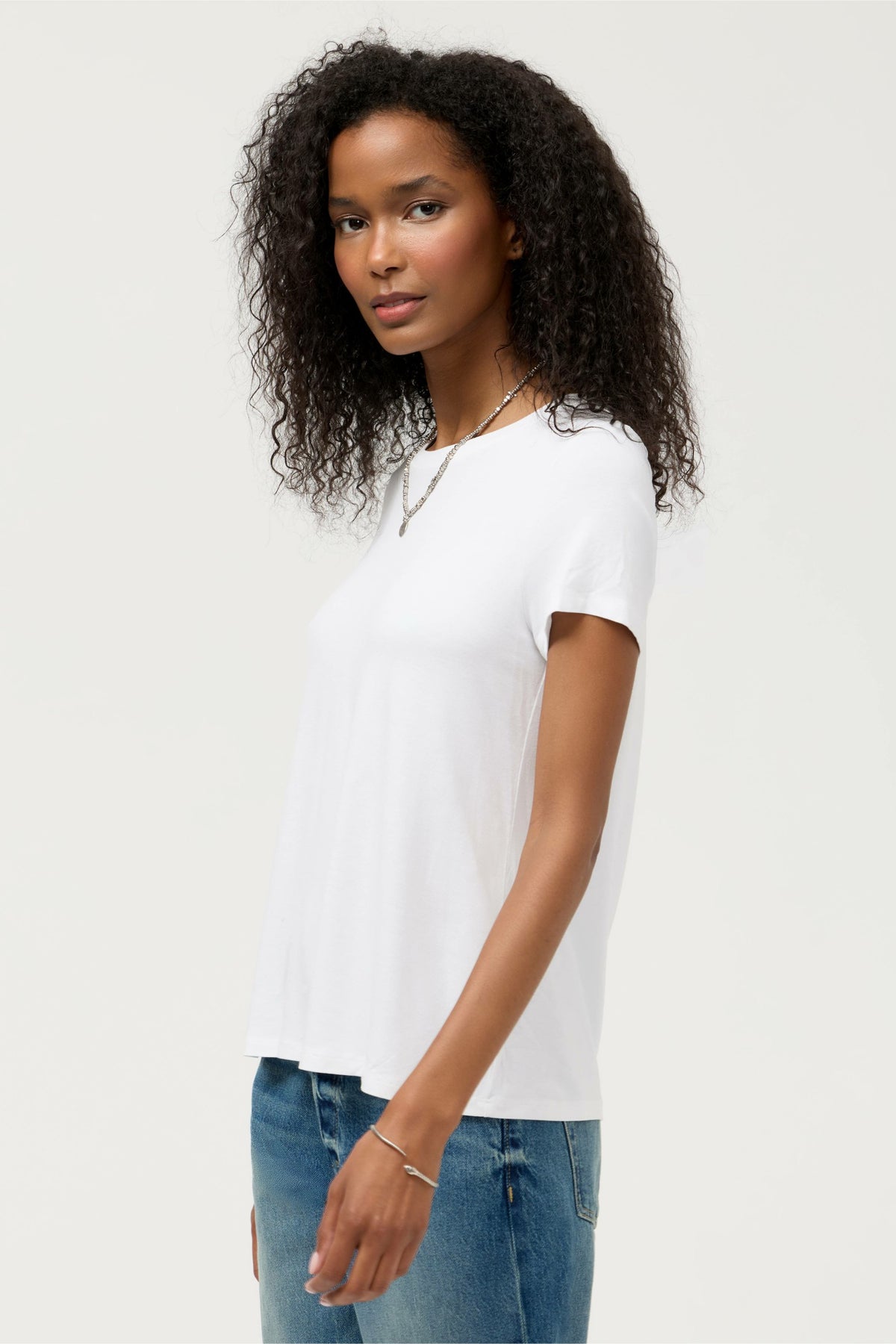 ESSENTIALS SHORT SLEEVE PLEAT BACK CREW NECK