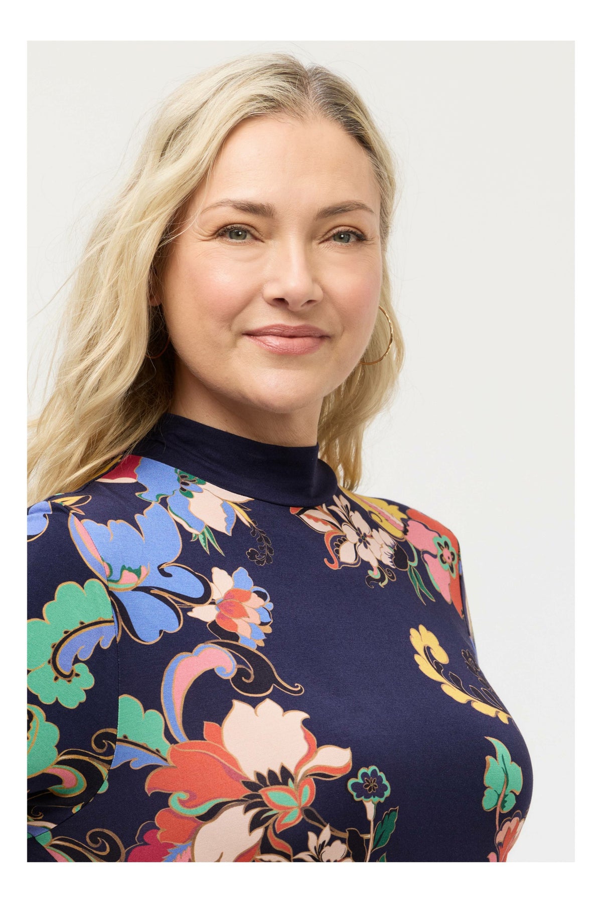 THE JANIE FAVORITE HANKERCHIEF HEM MOCK NECK DRESS